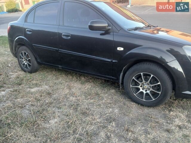 Чорний Кіа Ріо, об'ємом двигуна 1.4 л та пробігом 210 тис. км за 4700 $, фото 8 на Automoto.ua