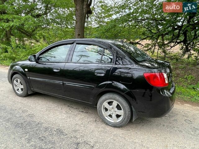 Черный Киа Рио, объемом двигателя 1.4 л и пробегом 91 тыс. км за 4500 $, фото 8 на Automoto.ua