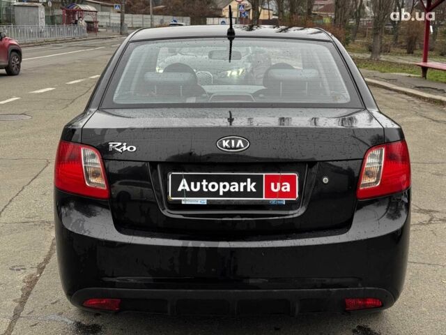 Чорний Кіа Ріо, об'ємом двигуна 1.4 л та пробігом 151 тис. км за 6490 $, фото 14 на Automoto.ua