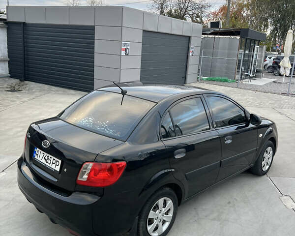 Кіа Ріо 2010 у Белой Церкве на Automoto.ua Чорний Кіа Ріо, об'ємом двигуна 1.4 л та пробігом 248 тис. км за 4250 $, фото 7 на Automoto.ua