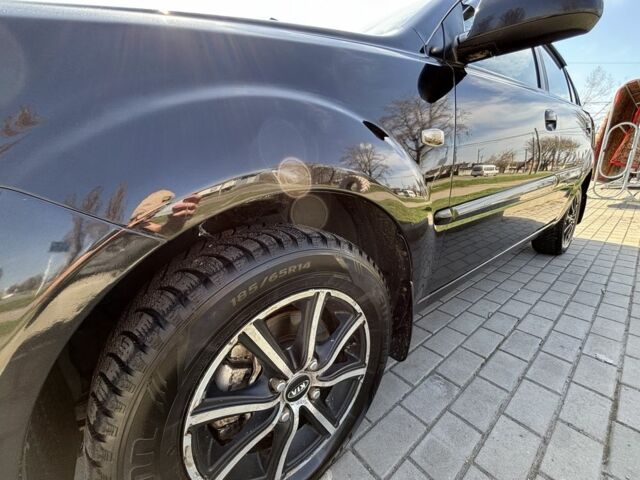 Черный Киа Рио, объемом двигателя 1.4 л и пробегом 290 тыс. км за 4500 $, фото 7 на Automoto.ua