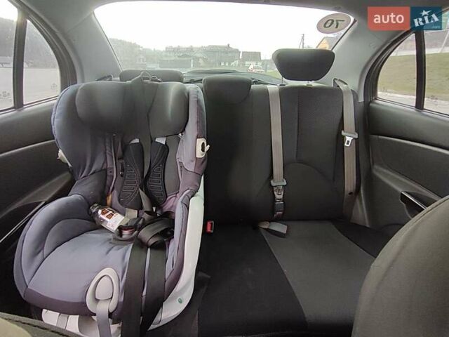Чорний Кіа Ріо, об'ємом двигуна 1.4 л та пробігом 253 тис. км за 4000 $, фото 12 на Automoto.ua