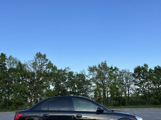 Черный Киа Рио, объемом двигателя 1.4 л и пробегом 140 тыс. км за 5500 $, фото 2 на Automoto.ua