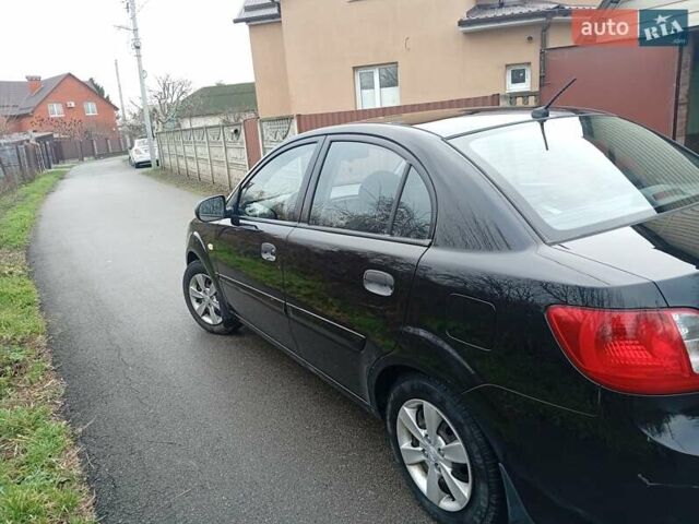 Черный Киа Рио, объемом двигателя 1.4 л и пробегом 186 тыс. км за 4800 $, фото 6 на Automoto.ua