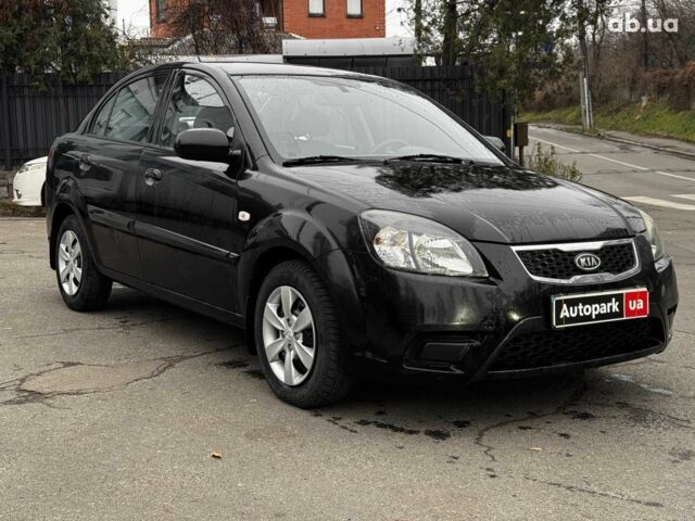 Чорний Кіа Ріо, об'ємом двигуна 1.4 л та пробігом 151 тис. км за 6490 $, фото 7 на Automoto.ua