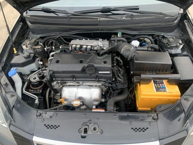 Чорний Кіа Ріо, об'ємом двигуна 1.4 л та пробігом 189 тис. км за 5463 $, фото 5 на Automoto.ua