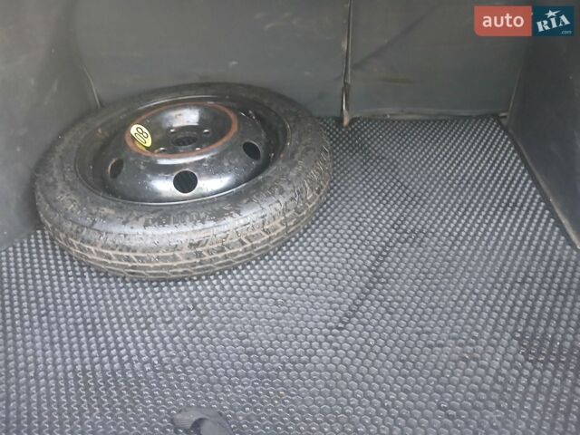 Чорний Кіа Ріо, об'ємом двигуна 1.4 л та пробігом 210 тис. км за 4700 $, фото 10 на Automoto.ua