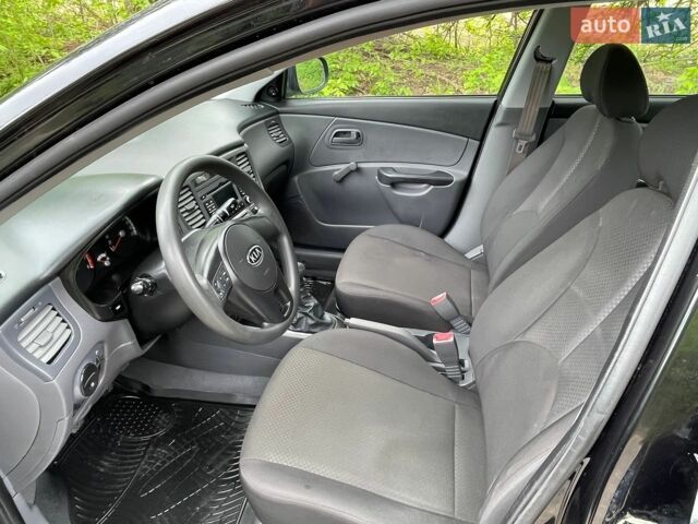 Черный Киа Рио, объемом двигателя 1.4 л и пробегом 91 тыс. км за 4500 $, фото 7 на Automoto.ua