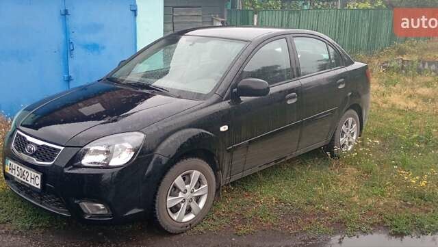 Черный Киа Рио, объемом двигателя 1.4 л и пробегом 32 тыс. км за 6800 $, фото 6 на Automoto.ua