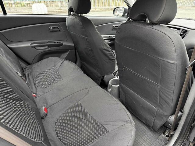 Черный Киа Рио, объемом двигателя 1.4 л и пробегом 151 тыс. км за 6490 $, фото 22 на Automoto.ua