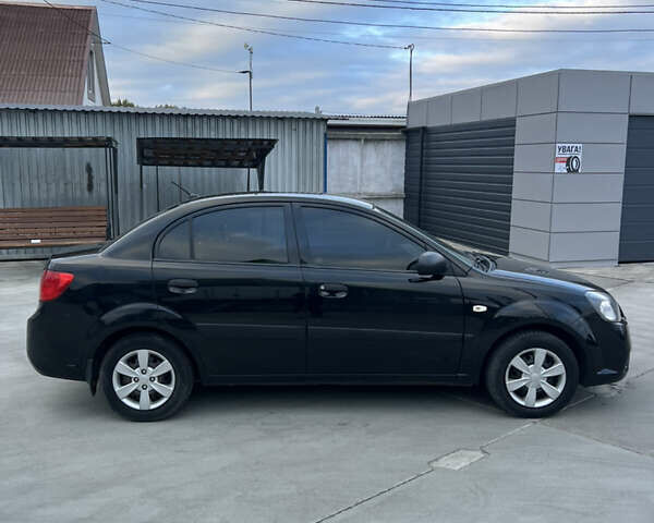 Кіа Ріо 2010 у Белой Церкве на Automoto.ua Чорний Кіа Ріо, об'ємом двигуна 1.4 л та пробігом 248 тис. км за 4250 $, фото 5 на Automoto.ua