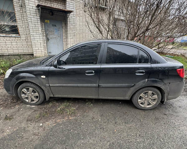 Чорний Кіа Ріо, об'ємом двигуна 1.5 л та пробігом 116 тис. км за 4000 $, фото 1 на Automoto.ua