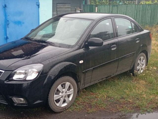 Чорний Кіа Ріо, об'ємом двигуна 1.4 л та пробігом 32 тис. км за 6800 $, фото 5 на Automoto.ua