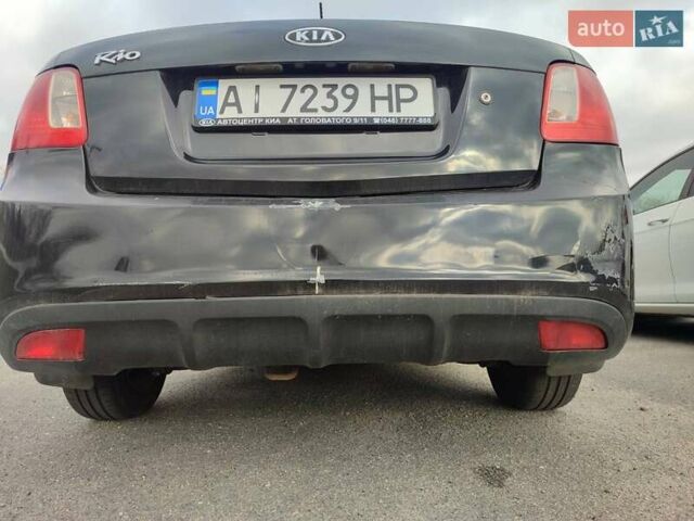 Чорний Кіа Ріо, об'ємом двигуна 1.4 л та пробігом 253 тис. км за 4000 $, фото 8 на Automoto.ua