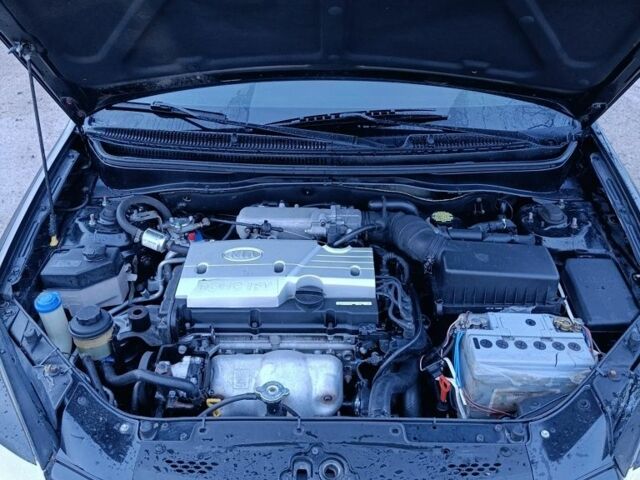 Чорний Кіа Ріо, об'ємом двигуна 1.4 л та пробігом 280 тис. км за 5300 $, фото 7 на Automoto.ua