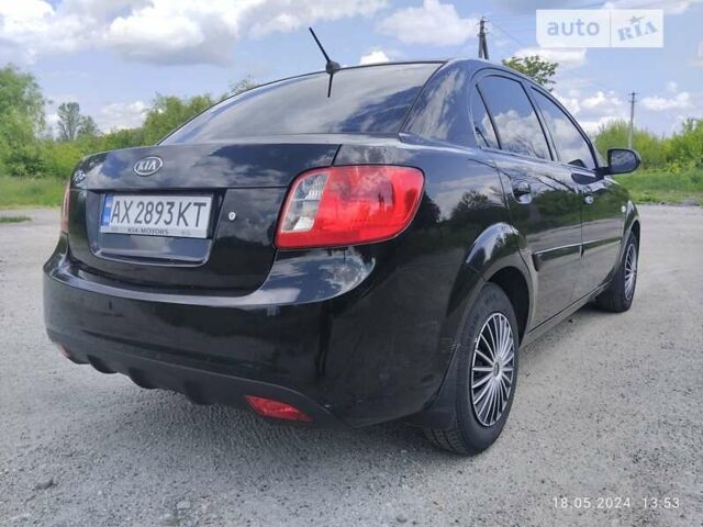 Черный Киа Рио, объемом двигателя 1.4 л и пробегом 205 тыс. км за 4600 $, фото 4 на Automoto.ua