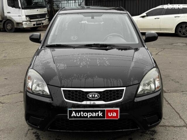 Чорний Кіа Ріо, об'ємом двигуна 1.4 л та пробігом 151 тис. км за 6490 $, фото 4 на Automoto.ua