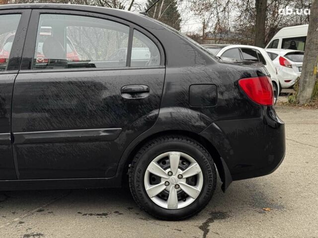 Чорний Кіа Ріо, об'ємом двигуна 1.4 л та пробігом 151 тис. км за 6490 $, фото 17 на Automoto.ua