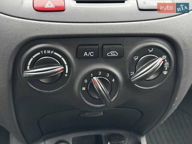 Черный Киа Рио, объемом двигателя 1.4 л и пробегом 151 тыс. км за 6490 $, фото 32 на Automoto.ua