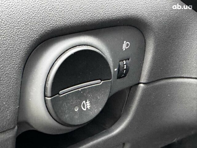 Чорний Кіа Ріо, об'ємом двигуна 1.4 л та пробігом 151 тис. км за 6490 $, фото 28 на Automoto.ua