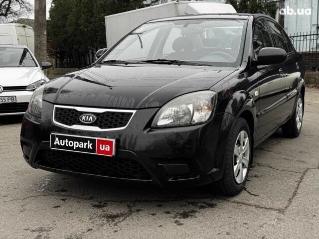 Чорний Кіа Ріо, об'ємом двигуна 1.4 л та пробігом 151 тис. км за 6490 $, фото 1 на Automoto.ua