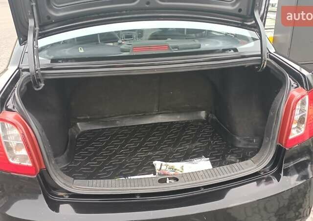 Черный Киа Рио, объемом двигателя 1.4 л и пробегом 150 тыс. км за 6000 $, фото 5 на Automoto.ua