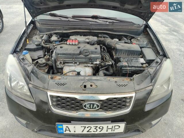 Черный Киа Рио, объемом двигателя 1.4 л и пробегом 253 тыс. км за 4000 $, фото 6 на Automoto.ua