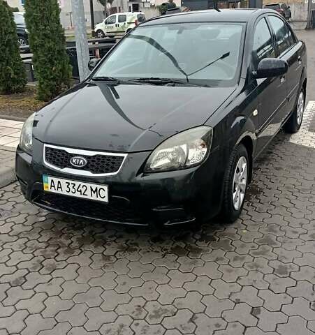 Черный Киа Рио, объемом двигателя 1.4 л и пробегом 150 тыс. км за 6000 $, фото 1 на Automoto.ua