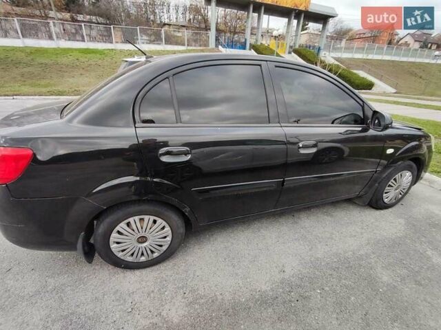 Чорний Кіа Ріо, об'ємом двигуна 1.4 л та пробігом 253 тис. км за 4000 $, фото 10 на Automoto.ua