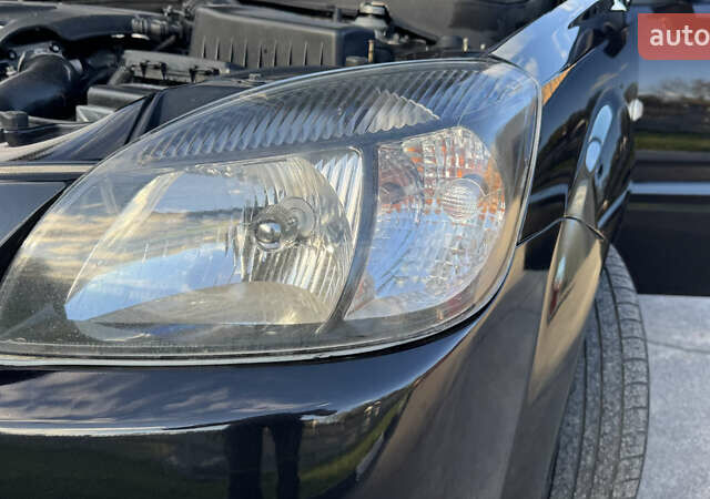 Чорний Кіа Ріо, об'ємом двигуна 1.5 л та пробігом 154 тис. км за 6900 $, фото 7 на Automoto.ua