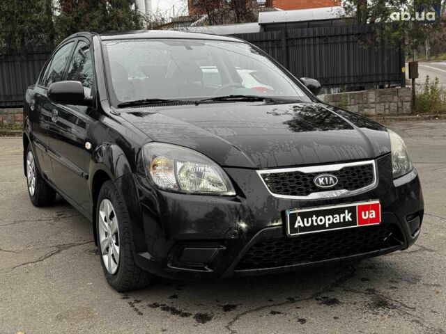 Чорний Кіа Ріо, об'ємом двигуна 1.4 л та пробігом 151 тис. км за 6490 $, фото 6 на Automoto.ua