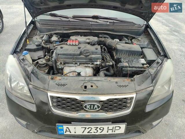 Чорний Кіа Ріо, об'ємом двигуна 1.4 л та пробігом 253 тис. км за 4000 $, фото 6 на Automoto.ua