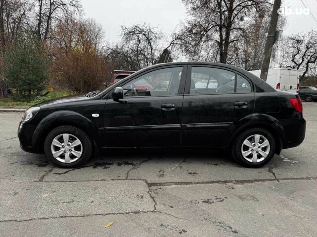 Чорний Кіа Ріо, об'ємом двигуна 1.4 л та пробігом 151 тис. км за 6490 $, фото 18 на Automoto.ua