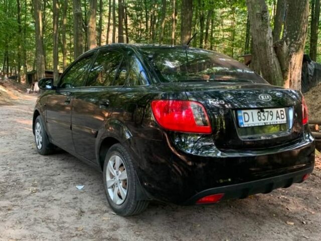 Черный Киа Рио, объемом двигателя 1.4 л и пробегом 270 тыс. км за 4499 $, фото 3 на Automoto.ua