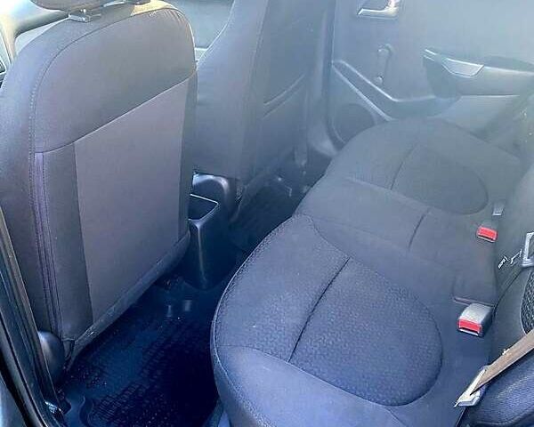 Черный Киа Рио, объемом двигателя 1.4 л и пробегом 1 тыс. км за 7100 $, фото 3 на Automoto.ua