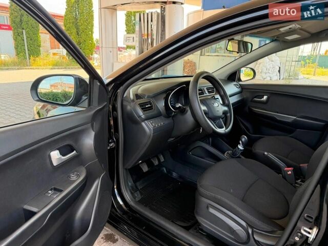 Чорний Кіа Ріо, об'ємом двигуна 1.4 л та пробігом 65 тис. км за 8300 $, фото 8 на Automoto.ua