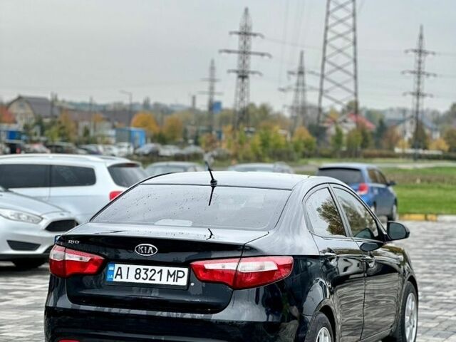 Черный Киа Рио, объемом двигателя 1.4 л и пробегом 180 тыс. км за 5900 $, фото 10 на Automoto.ua