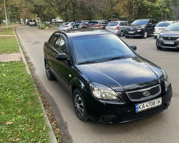 Черный Киа Рио, объемом двигателя 1.6 л и пробегом 125 тыс. км за 4950 $, фото 1 на Automoto.ua