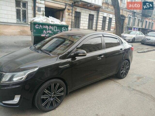 Черный Киа Рио, объемом двигателя 1.3 л и пробегом 120 тыс. км за 6850 $, фото 3 на Automoto.ua