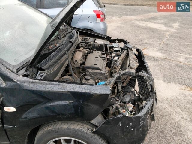 Чорний Кіа Ріо, об'ємом двигуна 1.4 л та пробігом 160 тис. км за 2450 $, фото 4 на Automoto.ua