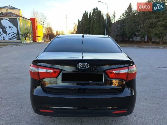 Черный Киа Рио, объемом двигателя 1.59 л и пробегом 231 тыс. км за 7600 $, фото 7 на Automoto.ua