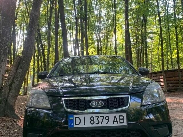 Чорний Кіа Ріо, об'ємом двигуна 1.4 л та пробігом 275 тис. км за 4700 $, фото 1 на Automoto.ua