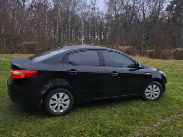 Черный Киа Рио, объемом двигателя 1.6 л и пробегом 231 тыс. км за 5850 $, фото 2 на Automoto.ua