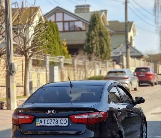 Черный Киа Рио, объемом двигателя 1.4 л и пробегом 180 тыс. км за 6500 $, фото 4 на Automoto.ua