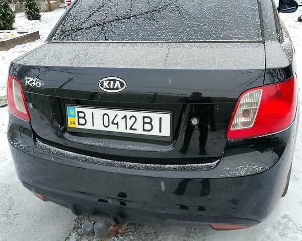 Черный Киа Рио, объемом двигателя 1.4 л и пробегом 100 тыс. км за 5800 $, фото 3 на Automoto.ua