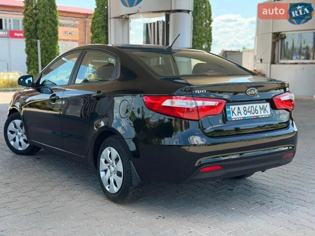Чорний Кіа Ріо, об'ємом двигуна 1.4 л та пробігом 65 тис. км за 8300 $, фото 7 на Automoto.ua