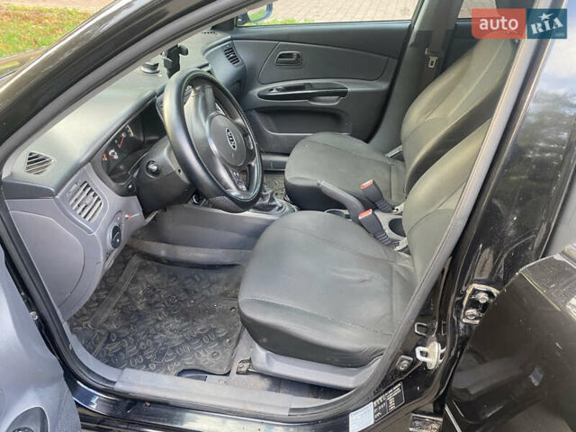 Черный Киа Рио, объемом двигателя 1.6 л и пробегом 125 тыс. км за 4950 $, фото 9 на Automoto.ua
