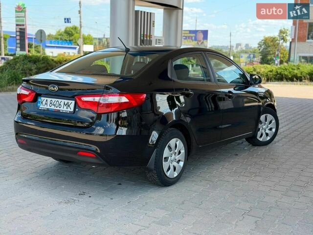 Чорний Кіа Ріо, об'ємом двигуна 1.4 л та пробігом 65 тис. км за 8300 $, фото 5 на Automoto.ua