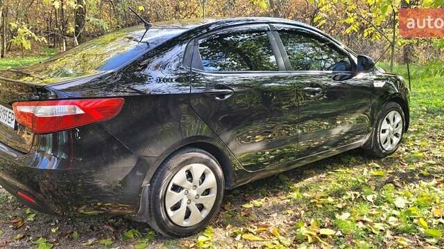 Черный Киа Рио, объемом двигателя 1.4 л и пробегом 120 тыс. км за 7200 $, фото 2 на Automoto.ua