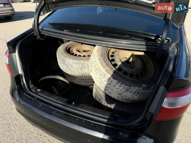 Черный Киа Рио, объемом двигателя 1.4 л и пробегом 162 тыс. км за 7700 $, фото 25 на Automoto.ua